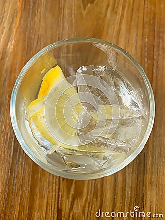 Glass ice and lemon on the table Stock Photo