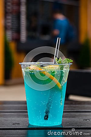 glass of Iced blue hawaii soda on table Blue Lagoon Cocktail Stock Photo