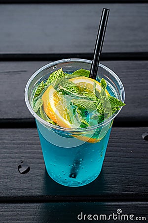 glass of Iced blue hawaii soda on table Blue Lagoon Cocktail Stock Photo