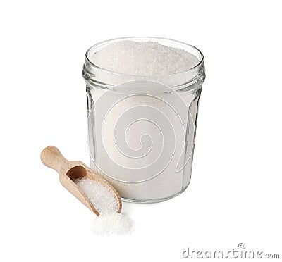 Glass jar of granulated sugar and scoop on white background Stock Photo