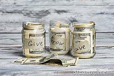 Glass jars with money. Stock Photo