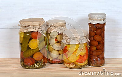 Glass Jars Of Preserved Vegetables Stock Photo