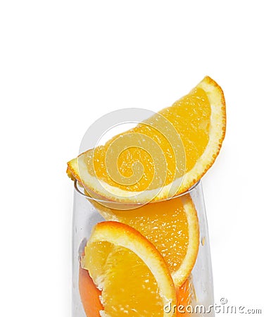 Glass with lobule orange fruits Stock Photo