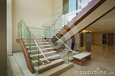 Glass and mahogany staircase Stock Photo