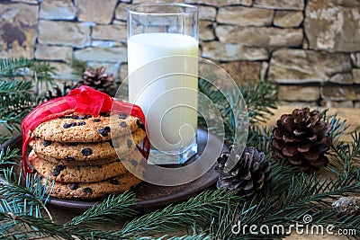 A glass of milk and cookies for Santa. Stock Photo