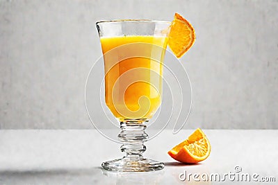 A glass of orange juice and juicy oranges. Fresh seasonal citrus fruits, natural juice Stock Photo