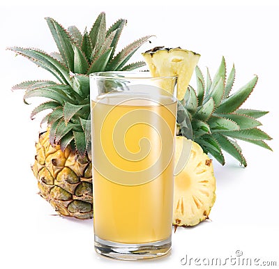 Glass of pineapple juice and group of pineapple fruits at the background. Studio shot isolated on white background Stock Photo