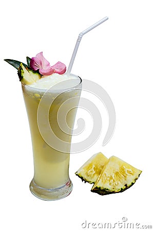 A Glass of Pineapple Smoothies with Sliced Pineapples Stock Photo