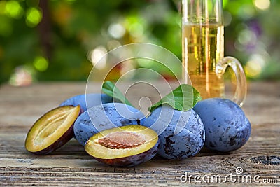 Glass of plum alcohol brandy Stock Photo