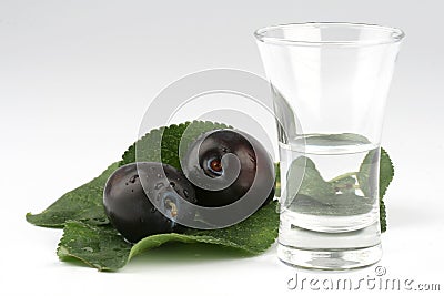 Glass of plum brandy Stock Photo