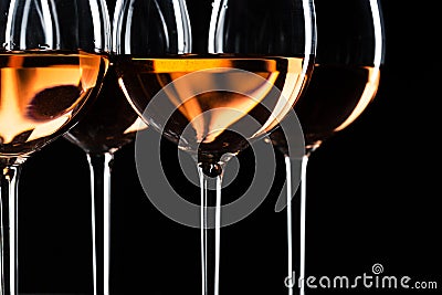 Glasses of wine in darkness Stock Photo