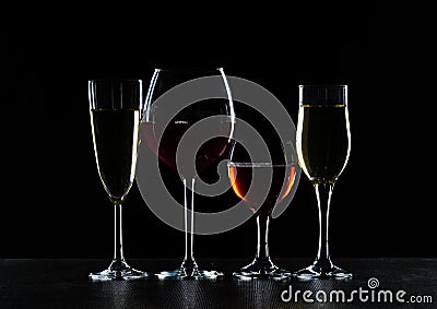 Glasses of wine in darkness Stock Photo