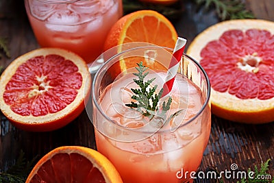 Glass of refreshing alcohol drink with orange juice, vodka or white rum served with ice orange slice. Stock Photo