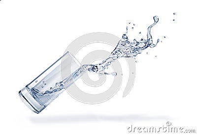 Glass with spilling water splash. Side view. On white background Stock Photo