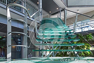 Glass stairway in a modern office building Stock Photo