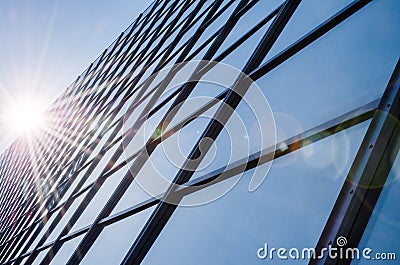 Glass and steel - mirrored facade of modern office building Stock Photo