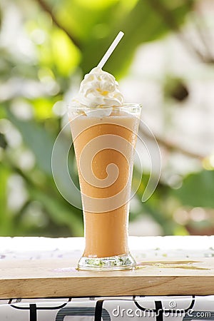 Glass of Thai Tea smoothie Stock Photo