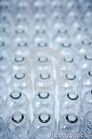 Glass transparent empty bottles assembly line Stock Photo