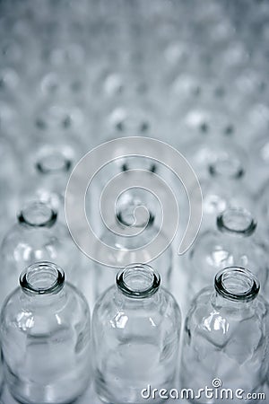 Glass transparent empty bottles assembly line Stock Photo