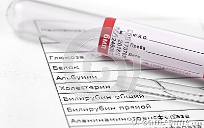 Glass tube and test tube on the general blood analysis results Stock Photo