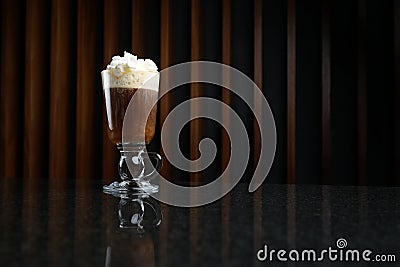 Glass of Viennese coffee topped with whipped cream Stock Photo