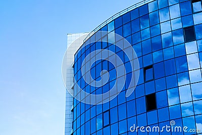 Glass wall facade with cloud sky reflection. Modern urban architecture background. Skyscraper business center, bank or hotel in Stock Photo