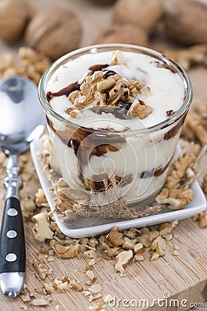 Glass with Walnut Chocolate Yoghurt Stock Photo