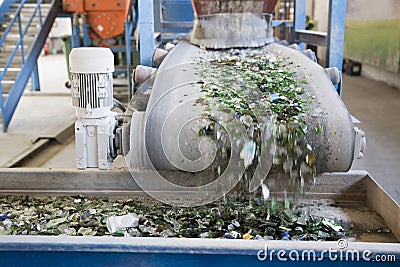 Glass waste in recycling facility. Glass particles Stock Photo