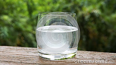 Glass of water with effervescent tablet Stock Photo