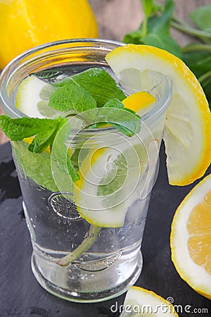 A glass of water, lemon and mint. Stock Photo