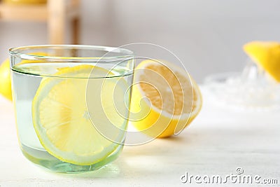 Glass of water with lemon slice Stock Photo