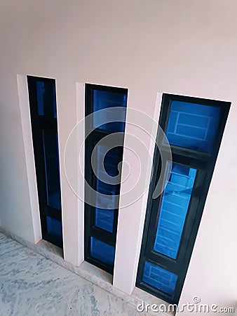 The glass window of room with black wood framework. Stock Photo