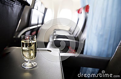 Glass of wine in the plane Stock Photo