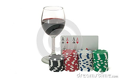 Glass of wine, poker, royal flush and gambling chips Stock Photo