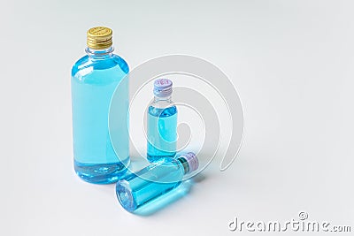 Glasses, alcohol-based hand sanitizers, 70% isopropyl alcohol, must have items product during the COVID- 19 pandemic, isolated on Stock Photo