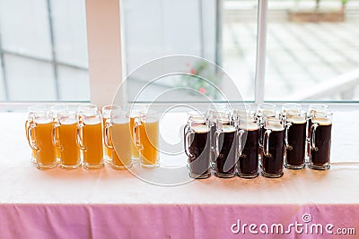 Glasses of beer and cola Stock Photo