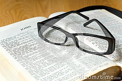 Glasses on a Bible Stock Photo