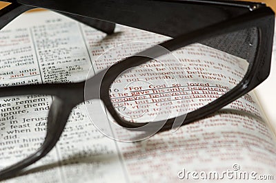 Glasses on a Bible Stock Photo