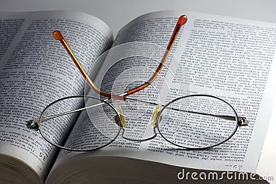 Glasses on the bible Stock Photo