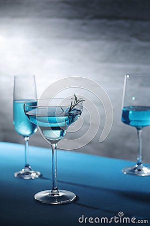 Glasses with blue alcohol cocktail ready for a party Stock Photo