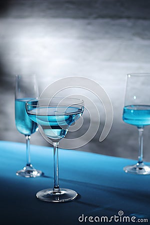 Glasses with blue alcohol cocktail ready for a party Stock Photo