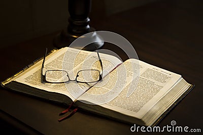 Glasses on book Stock Photo