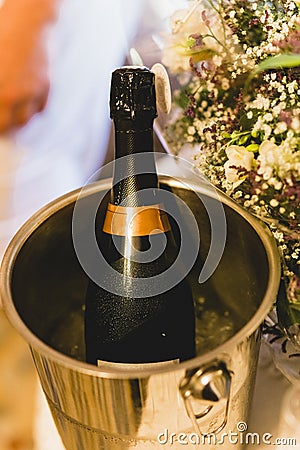 Glasses and bottles of cold champagne for the toast of the couple Stock Photo