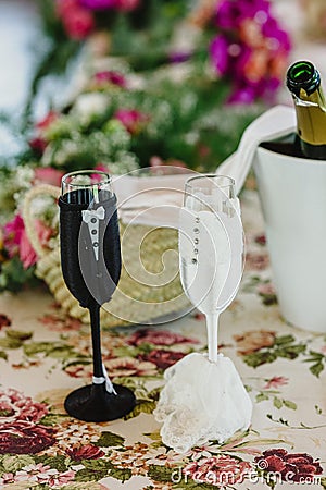 Glasses and bottles of cold champagne for the toast of the couple Stock Photo