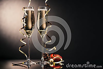 Glasses of champagne and christmas decorations Stock Photo