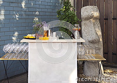 Glasses of cocktails on the bar. Glasses of sparkling wine with red alcohol Stock Photo