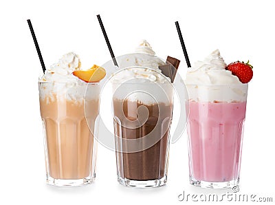 Glasses with milk shakes on white background Stock Photo