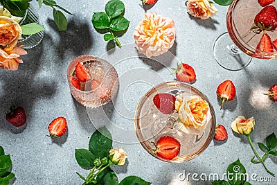 Glasses of delicious strawberry wine with roses, banner, menu, recipe place for text, top view Stock Photo