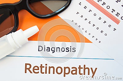 Glasses, eye drops and eye test chart is around inscription Diagnosis Retinopathy. Concept photo for causes, diagnosis, treatment Stock Photo