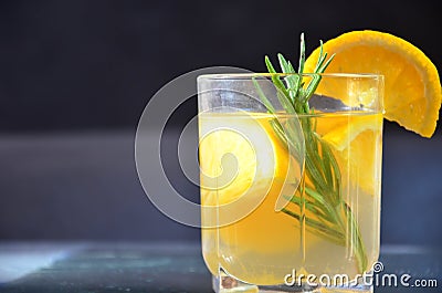 glasses of honey bourbon cocktail with rosemary whiskey sour drink with orange peel, or winter warmer drink punch or Stock Photo